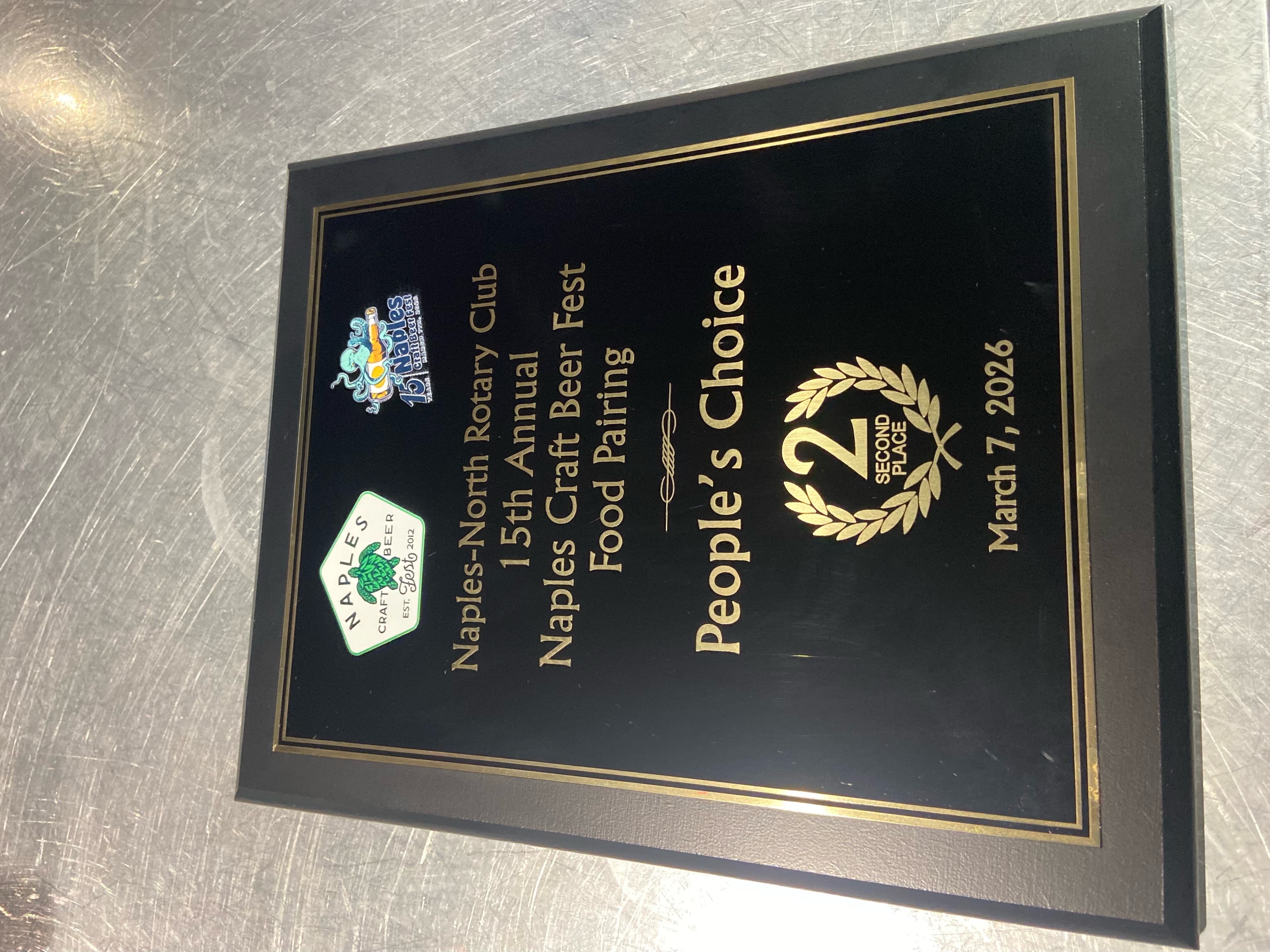 2026 Naples Craft Beer Fest food pairing People’s Choice second-place award, dated March 7, 2026