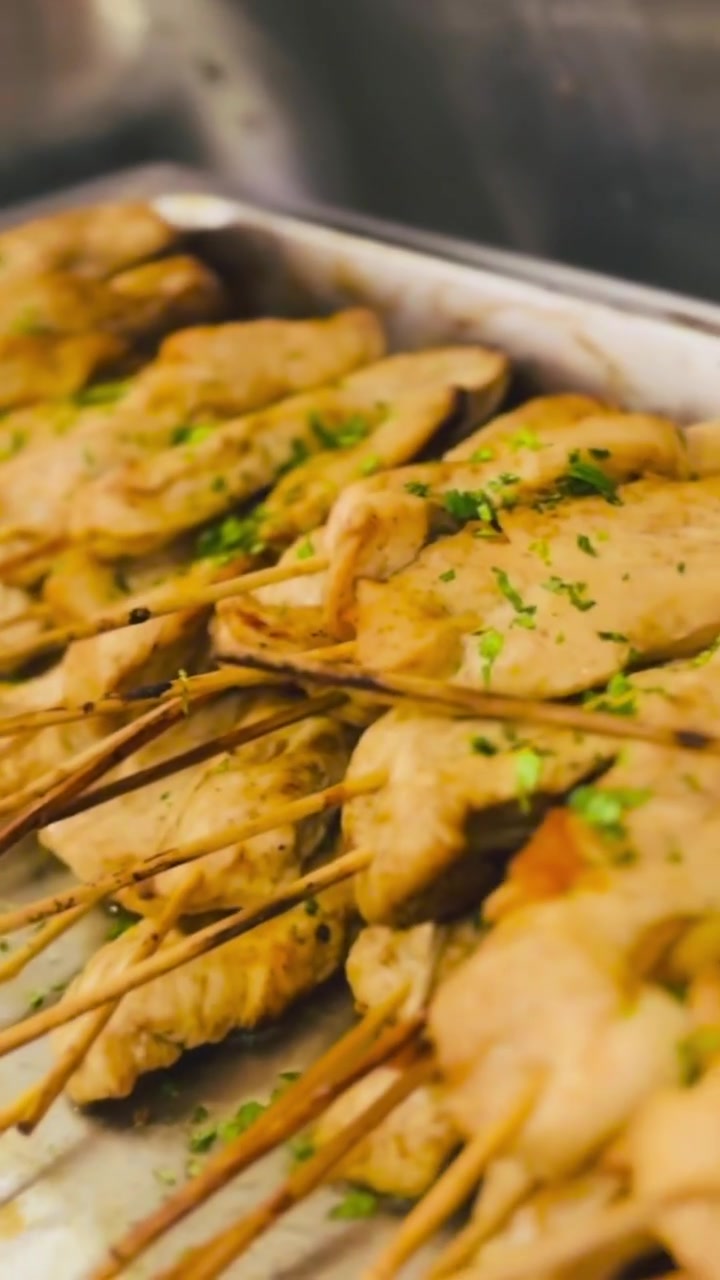 Chicken skewers arranged in a serving dish for the Naples wedding