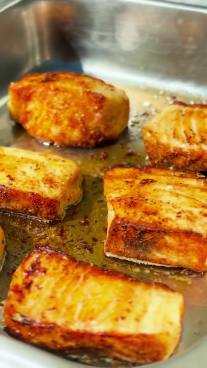 Golden seared scallops prepared for the private-home gathering